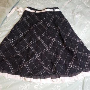 [12] Kids long black patterned skirt with ribbon belt